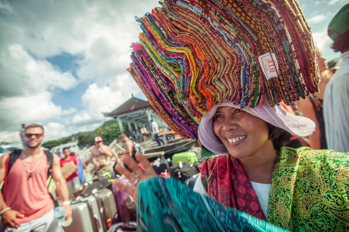 A local woman selling sarongs during G Adventures' Solo-ish Bali tour.