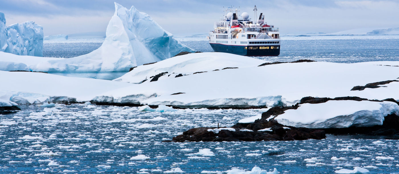 Big cruise ship in the Antarctic waters (Photo via goinyk / iStock / Getty Images Plus)