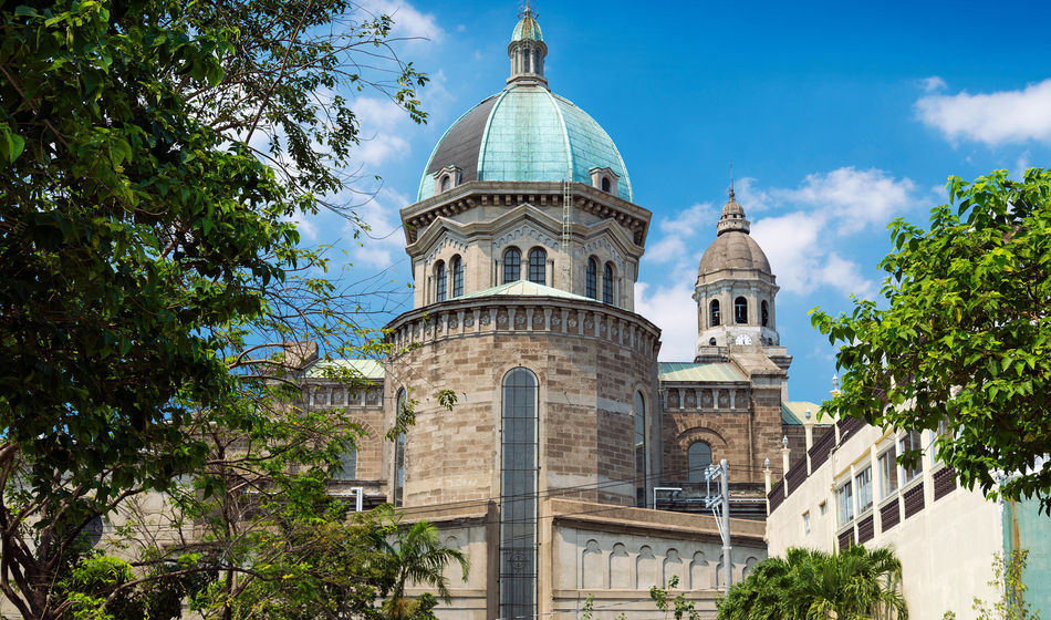 manila cathedral landmark in intramuros phillipines (photo via jackmalipan / iStock / Getty Images Plus)