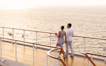 Couple walking on cruise ship deck