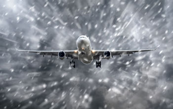 Airplane flying in a snowstorm.