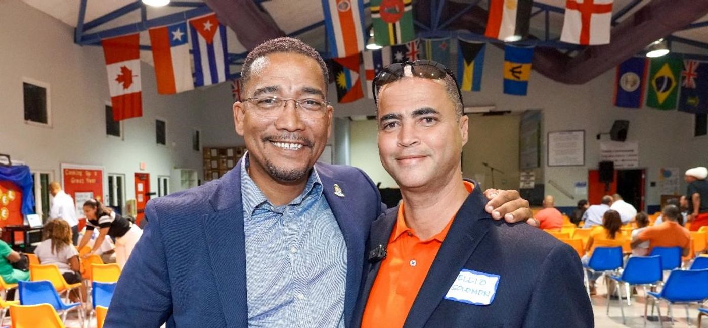 Image: : “The tendering process is not necessarily the best one for the environment.” – Ellio Solomon (right) with Kenneth Bryan, the Cayman Islands deputy premier and minister of tourism. (Photo courtesy of the Cayman Islands Department of Tourism)