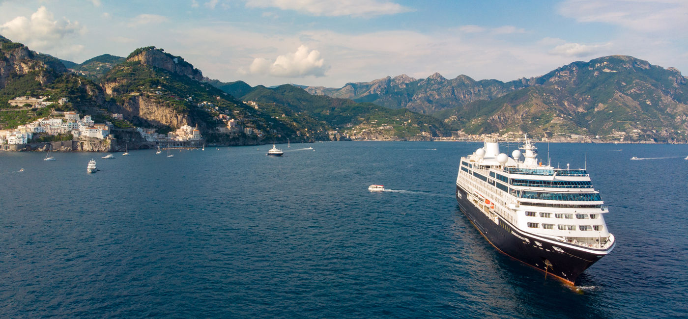 Image: Azamara ship in Amalfi, Italy. (Photo via Azamara)