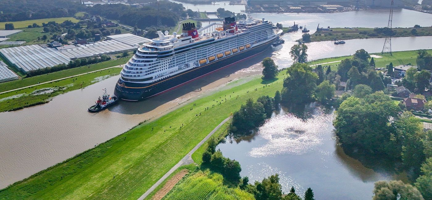 Image: Disney Treasure on the Ems River (Photo Credit: Disney Cruise Line)