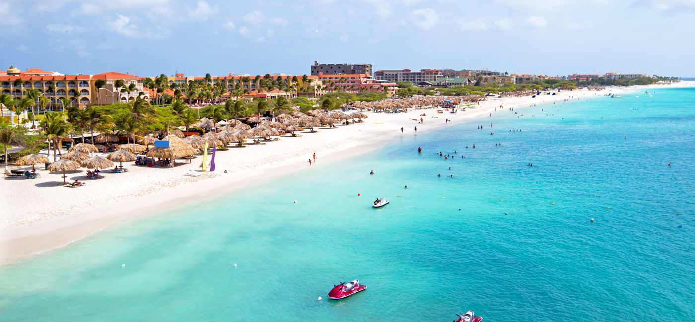 Image: Eagle Beach, Aruba (Photo Credit: Nataraj/Adobe Stock)