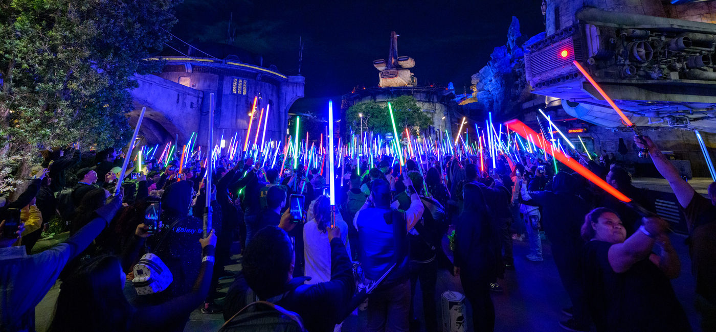 Image: Guests brandish their lightsabers at the 'Disneyland After Dark: Star Wars Nite' event. (Photo Credit: Disneyland Resort)