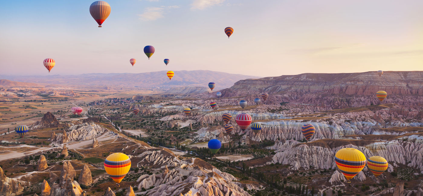 Image: Hot air balloons flying over Cappadocia, Turkey. (photo via TPopova/iStock/Getty Images Plus) (TPopova / iStock / Getty Images Plus)