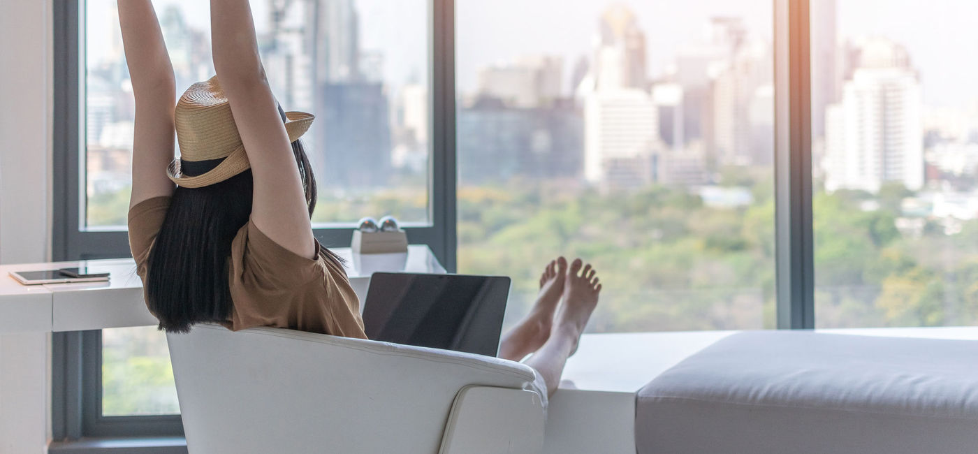 Image: PHOTO: Combining business travel with leisure time. (Photo via iStock/Getty Images Plus/Chinnapong)