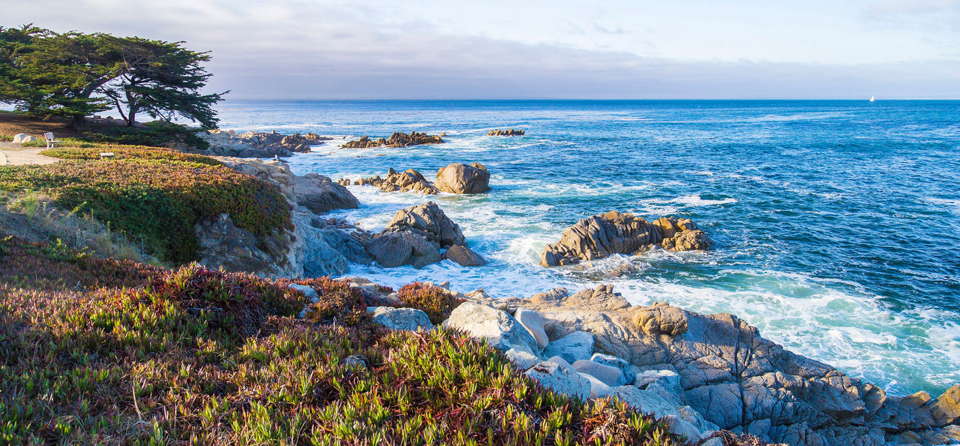 Image: Seascape of Monterey Bay at Sunset in Pacific Grove, California. (photo via Serbek / iStock / Getty Images Plus)