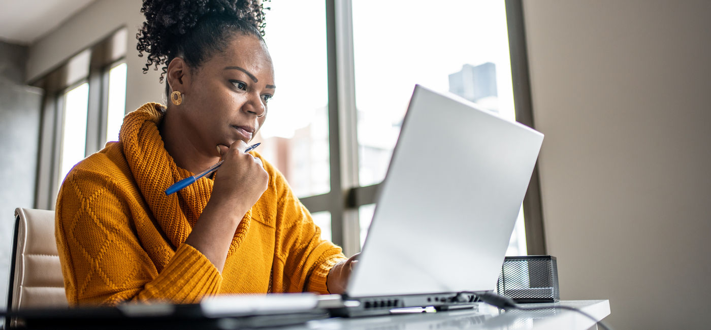 Image: Travel advisor working from the home office. (Photo Credit: Drs Producoes/E+)