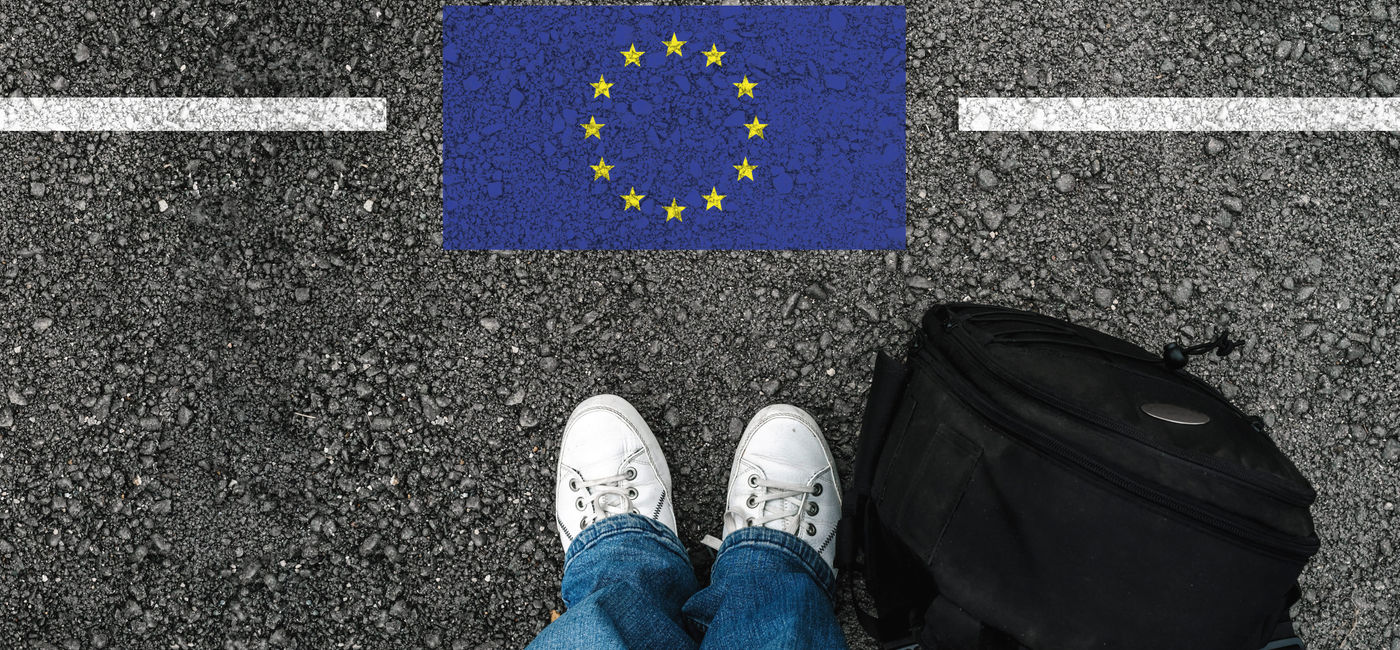 Image: Traveler entering the European Union. (Photo Credit: Adobe/mirsad)