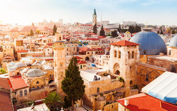 Old City of Jerusalem with the aerial view. View of the Church of the Holy Sepulchre, Israel. (Photo via seregalsv / iStock / Getty Images Plus)