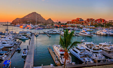 Cabo San Lucas Marina at sunset (Photo via LindaYG / iStock / Getty Images Plus)