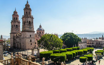 High point of view of Morelia Cathedral and town square. (photo via Esdelval / iStock / Getty Images Plus)