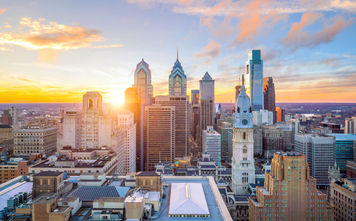 Skyline of downtown Philadelphia at sunset USA (Photo via f11photo / iStock / Getty Images Plus)