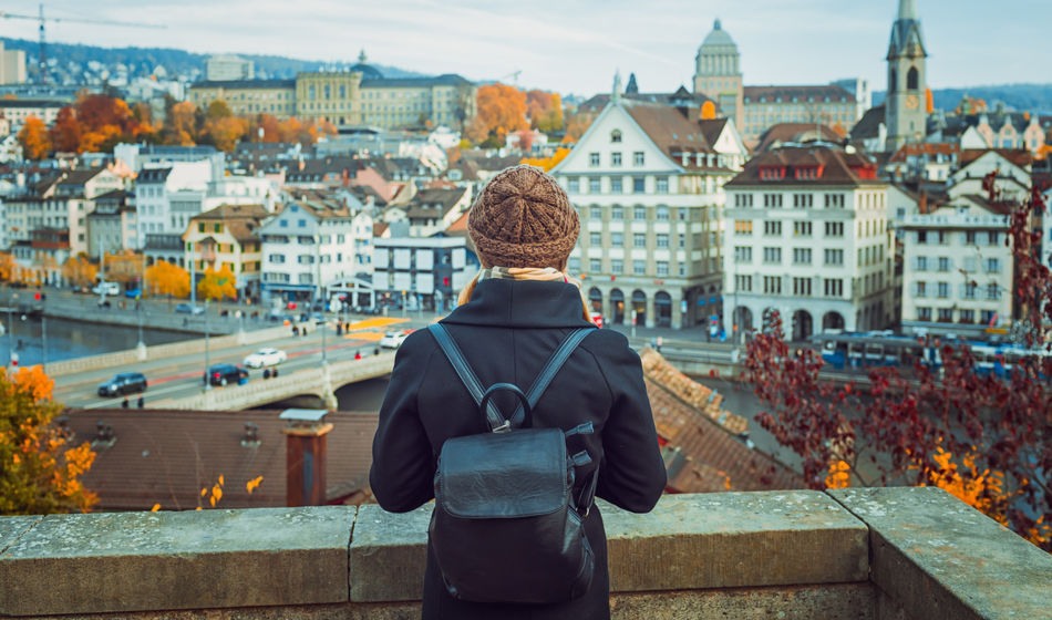 Traveler backpacking through Zurich, Switzerland