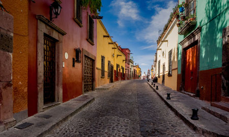 The many backstreets of San Miguel de Allende in Mexico can be quiet, colorful and beautifully preserved. A wonderful serene place for a morning or evening walk. (photo via thupton / iStock / Getty Images Plus)