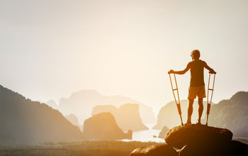 Hiker on crutches, protect your trip with travel insurance