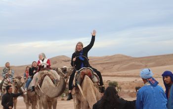 Riding a camel in Morocco