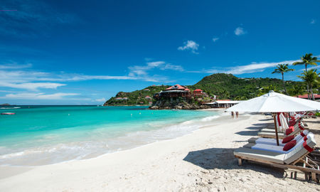 French island in a Caribbean sea (photo via daniloforcellini / iStock / Getty Images Plus)