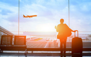 Traveler awaiting flight at the airport