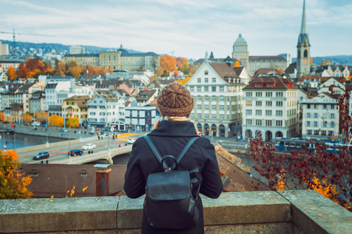 Traveler backpacking through Zurich, Switzerland