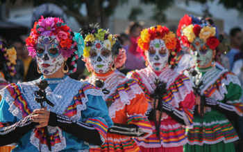 Women celebrating Dia de los Muertos in Mexico