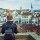 Traveler backpacking through Zurich, Switzerland